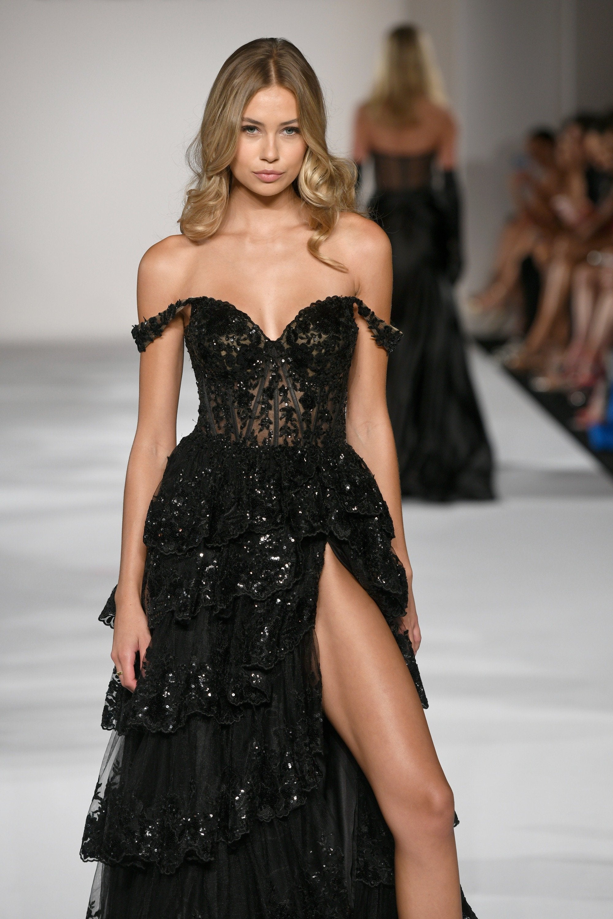 elegant black slit dress wiith sparkle detail